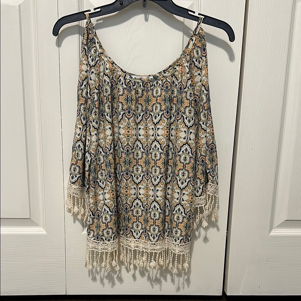 Open shoulder fringed top